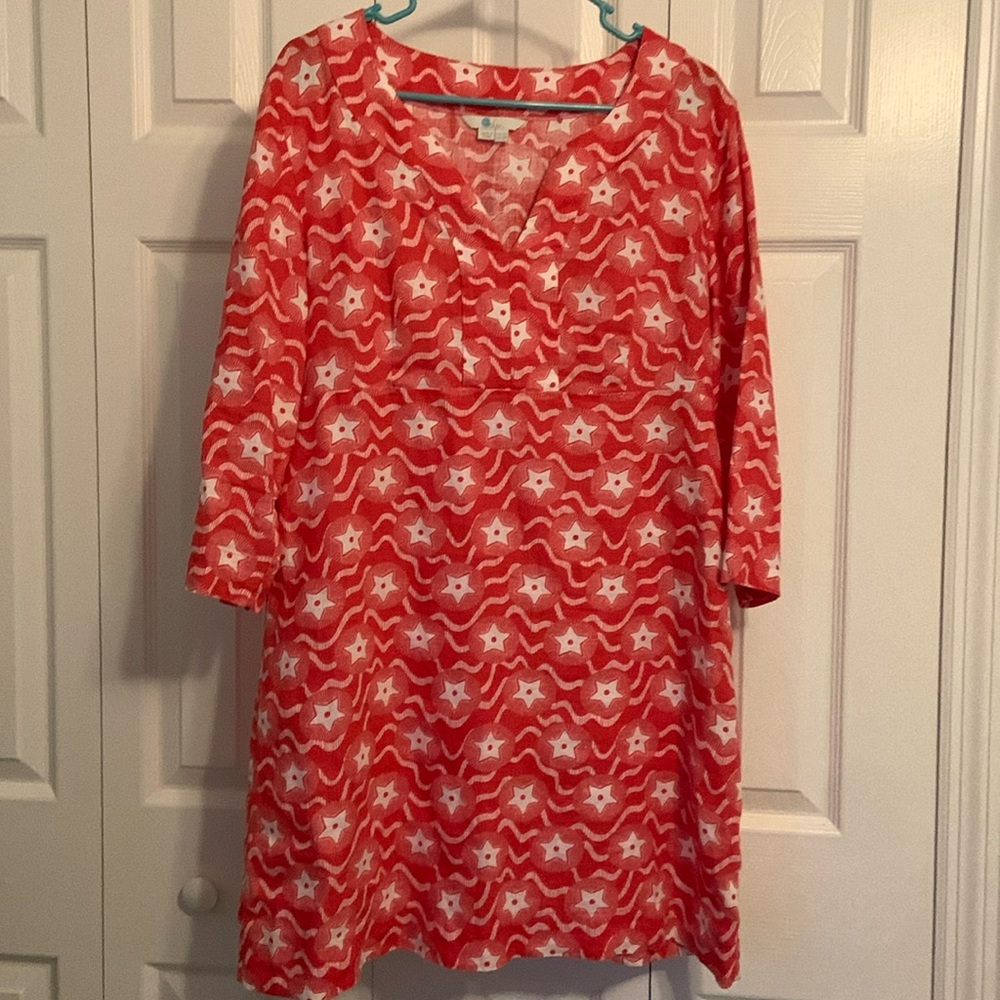 Red/white linen tunic with star pattern.